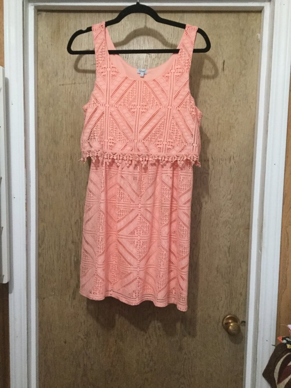 Kismet size medium coral colored dress crocheted lace top layer with lining